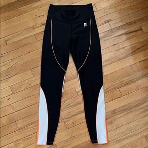 P.E Nation Black and Orange Leggings